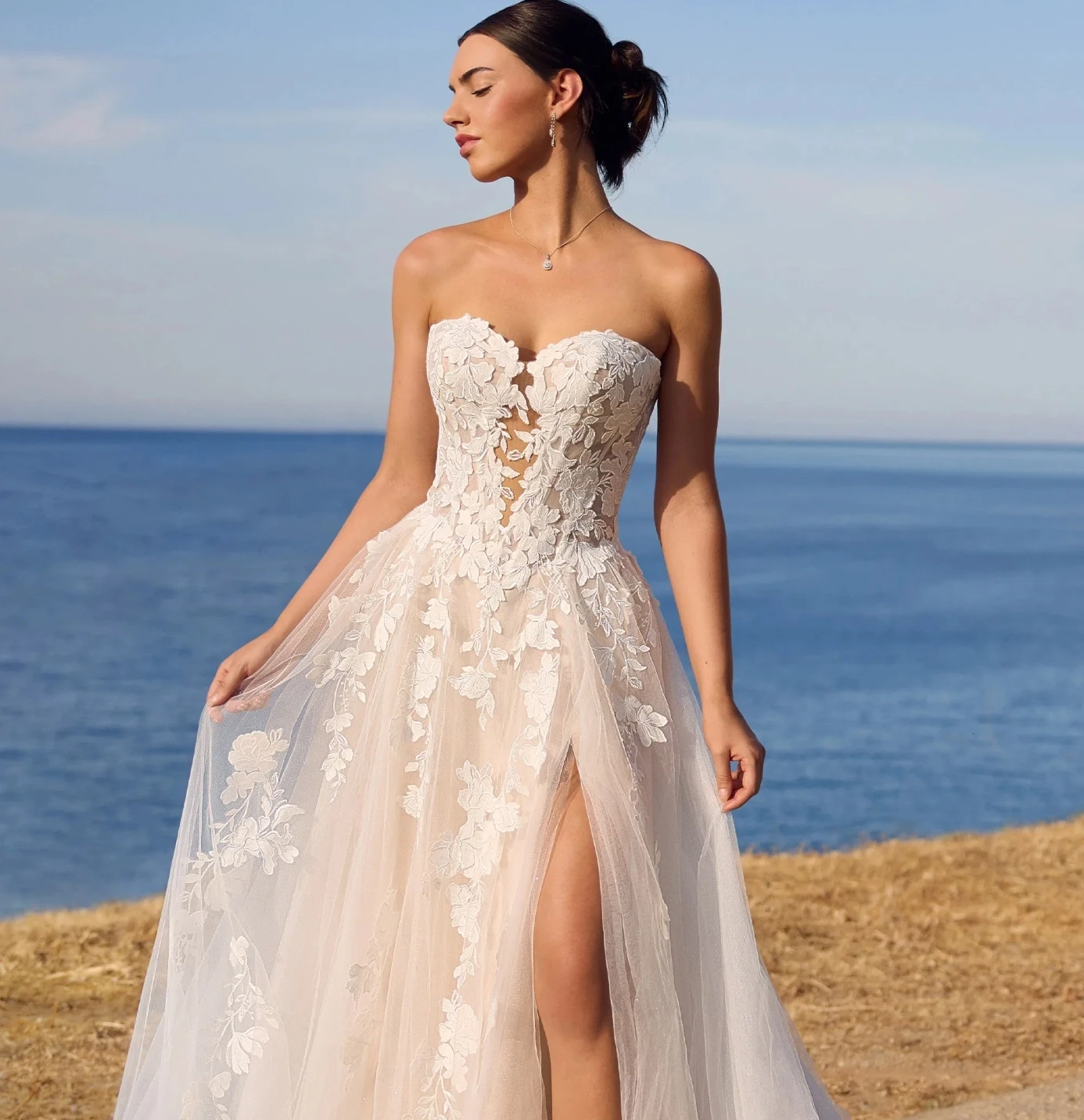 Photo of model wearing a Sophia Tolli collection bridal gown